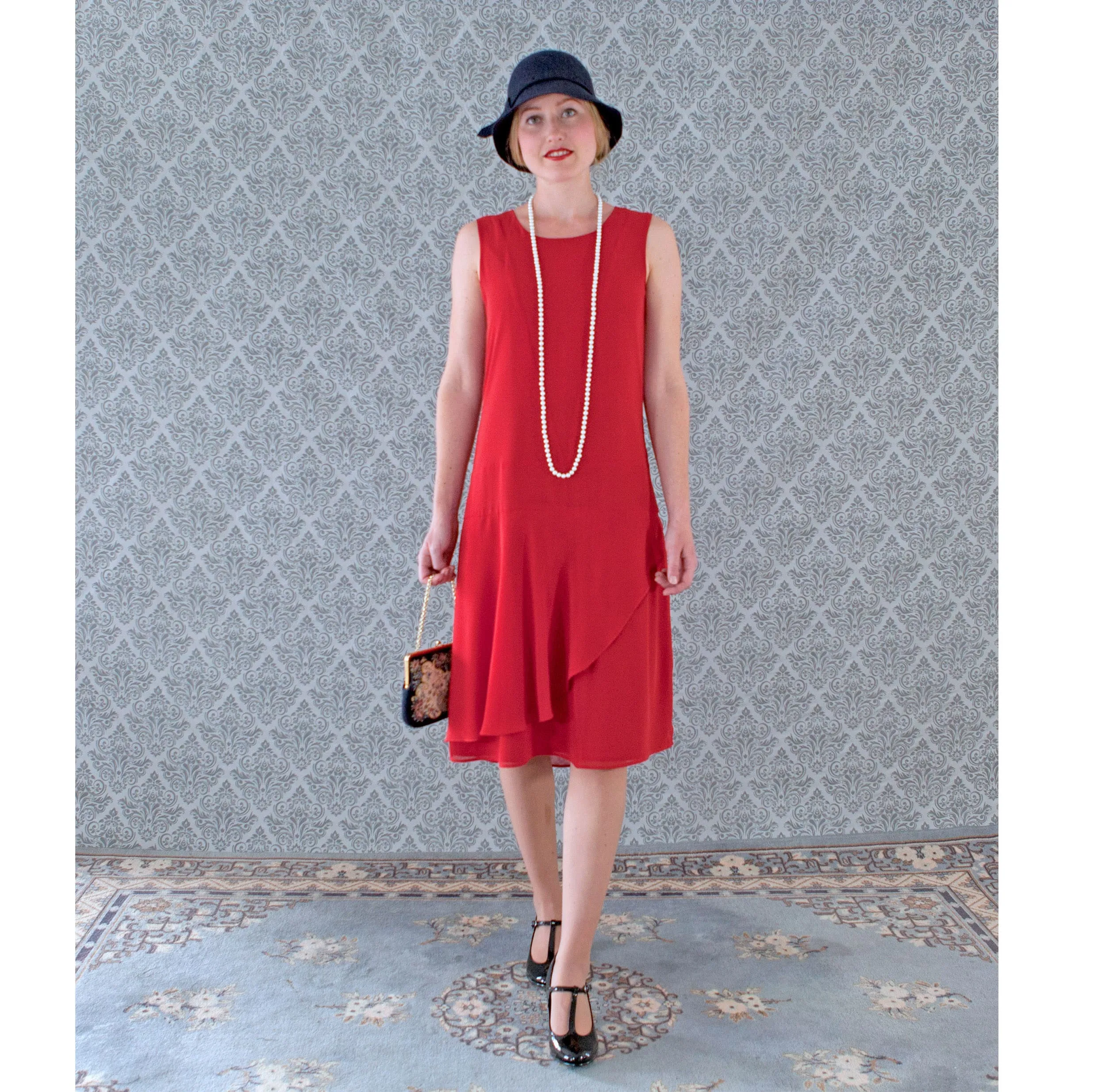 Red chiffon flapper dress with a ruffled skirt detail
